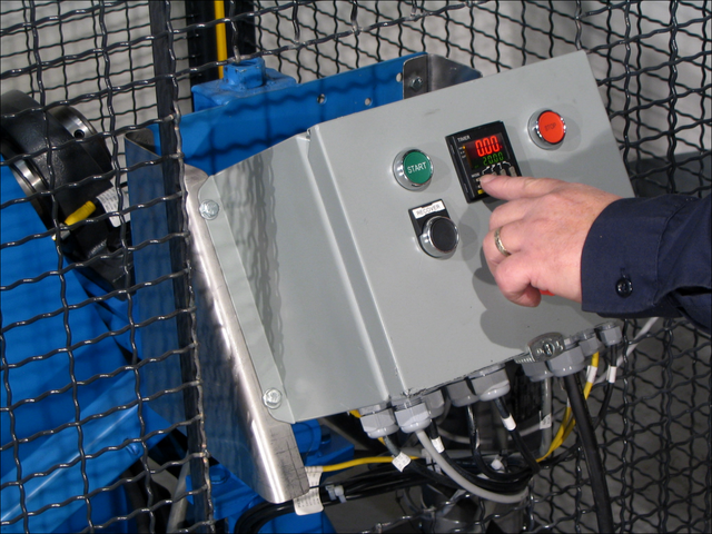 Setting the timer for 311 Series Automated Tilt-to-Load Drum Tumbler