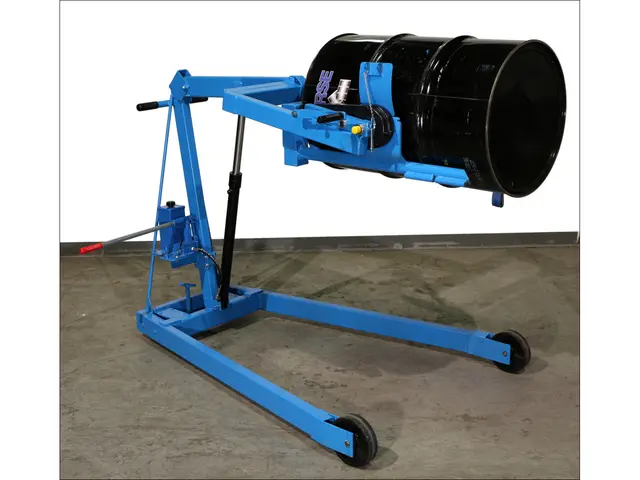 With drum in horizontal position, release web strap for racking - Model 405 with manual lift and tilt control