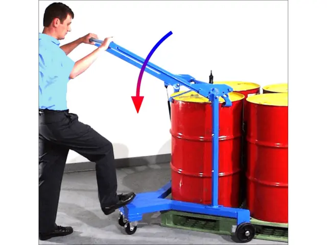 Lower drum palletizer handle to lift a drum from the floor or a pallet up to 6" high