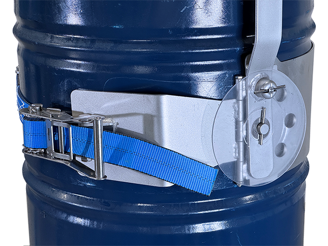 Web Strap and Ratchet secured around drum. Tilt Locks have Polycarbonate Guards.