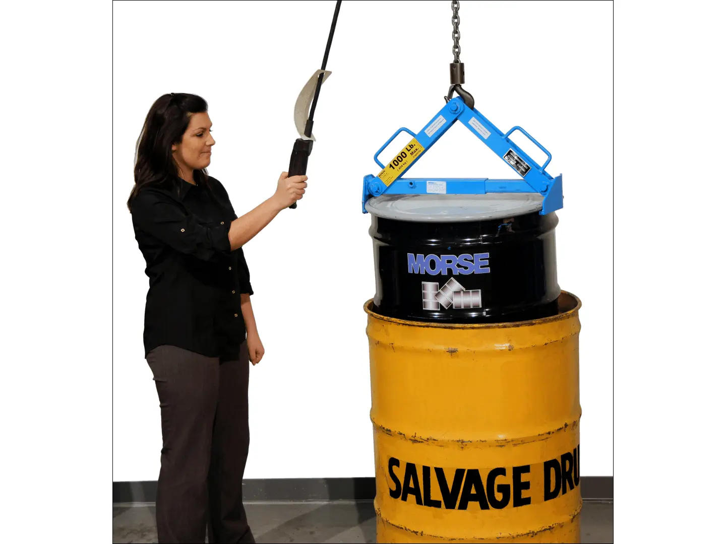 Place a 55-gallon (210 liter) drum into a salvage drum